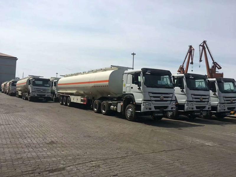 15 HOWO truck heads and 45,000 litre fuel tanker trailers shipped to Abidjan port